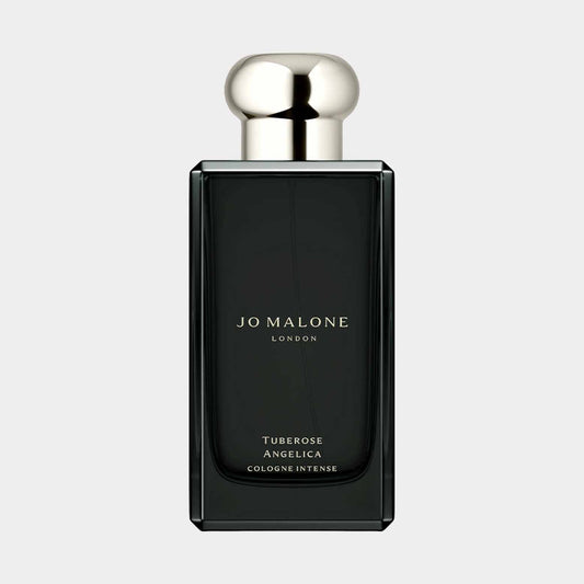 A sleek, dark bottle of Jo Malone London Tuberose Angelica Sample, featuring a polished silver cap and elegant minimalist design. The label displays the fragrance name prominently.