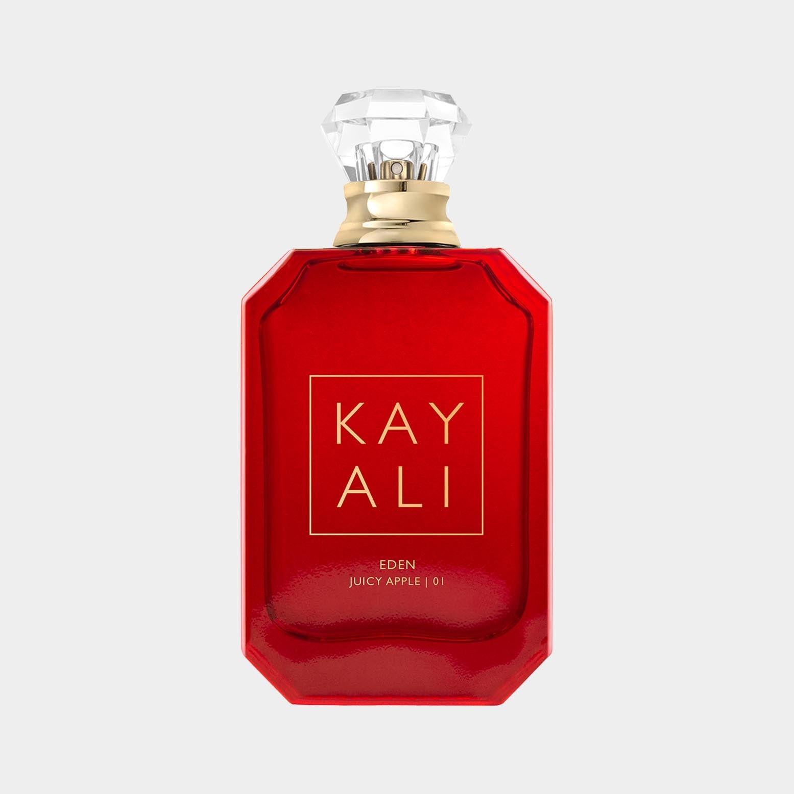 Kayali Eden Juicy Apple 01 Sample perfume bottle featuring a striking red design and a crystal-like cap, showcasing a fresh and fruity scent.