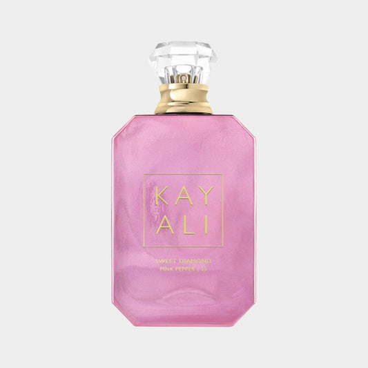 Kayali Sweet Diamond Pink Pepper 25 Sample, a stylish pink fragrance bottle with a diamond-shaped cap, showcasing an elegant and modern design.