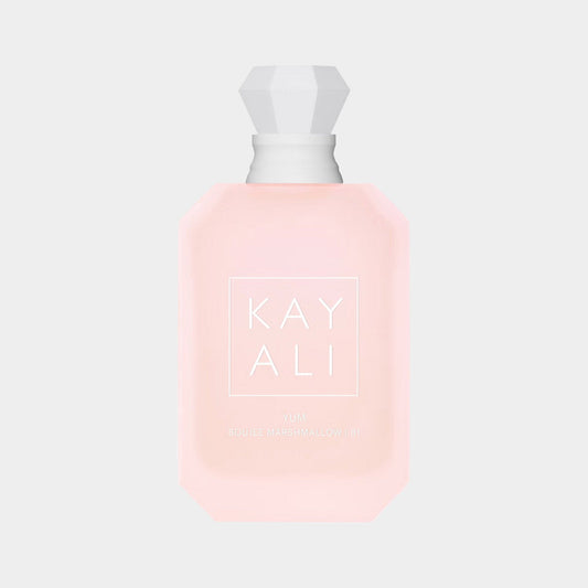 Kayali Yum Boujee Marshmallow | 81 sample fragrance bottle, featuring a soft pink hue and an elegant hexagonal shape with a white cap.