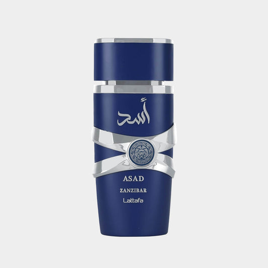 A sleek blue bottle of Lattafa Asad Zanzibar Sample, featuring an elegant silver band and emblem, designed for a luxurious fragrance experience.