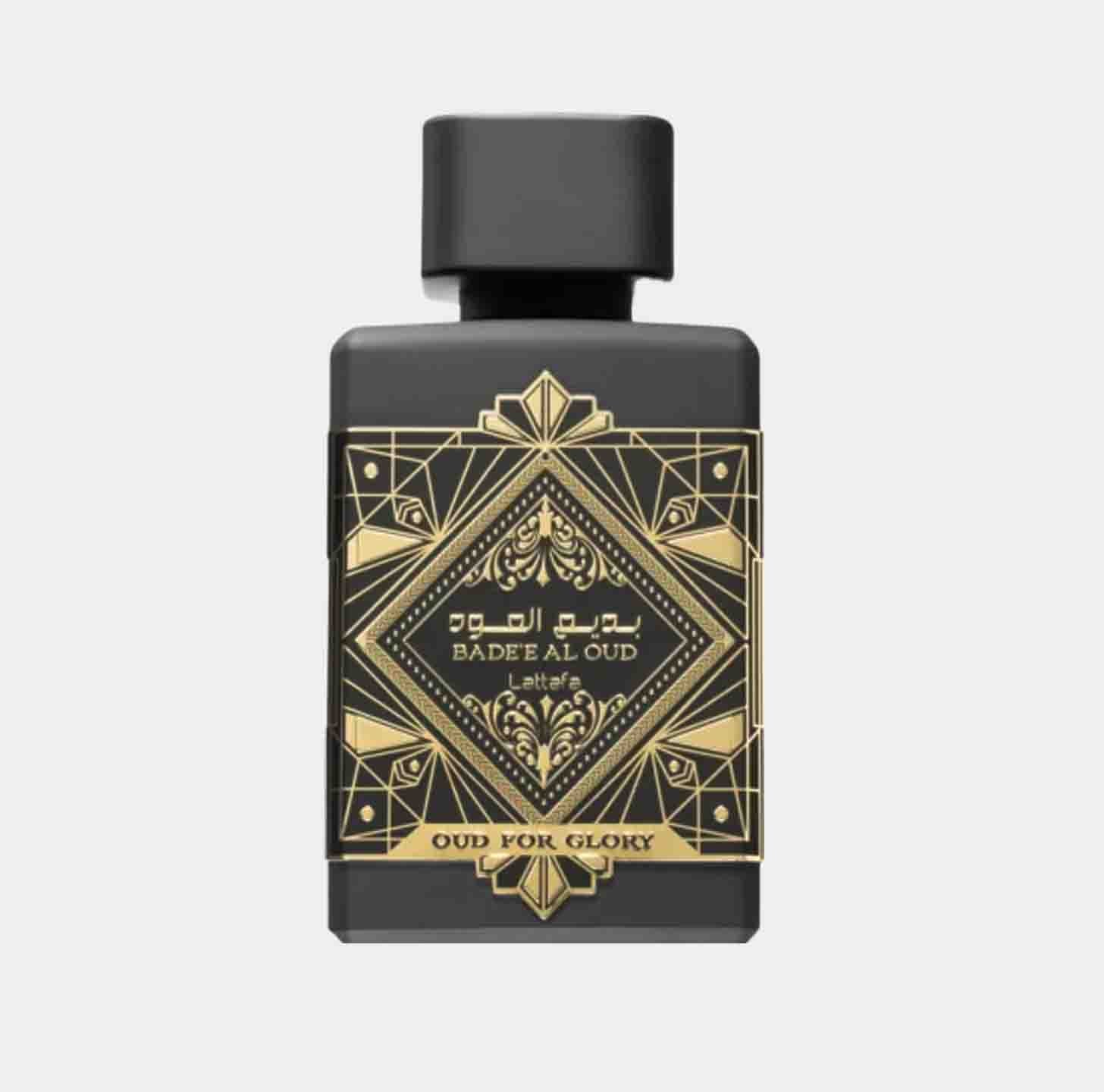 A sleek black perfume bottle adorned with intricate gold designs, featuring the label 'Lattafa Perfumes Oud for Glory Sample'.