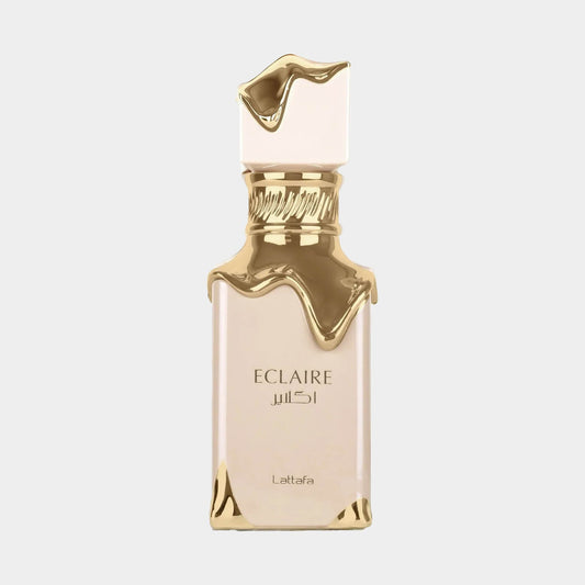 A luxurious bottle of Lattafa Eclaire Sample, featuring an elegant design with a gold dripped cap and a minimalist glass body, showcasing its sophisticated fragrance.