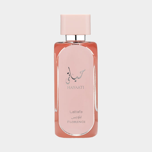 A sleek, pink bottle of Lattafa Hayaati Florence Sample, featuring elegant branding on the front and a sophisticated design. The bottle is topped with a matching cap, embodying a sense of luxury.