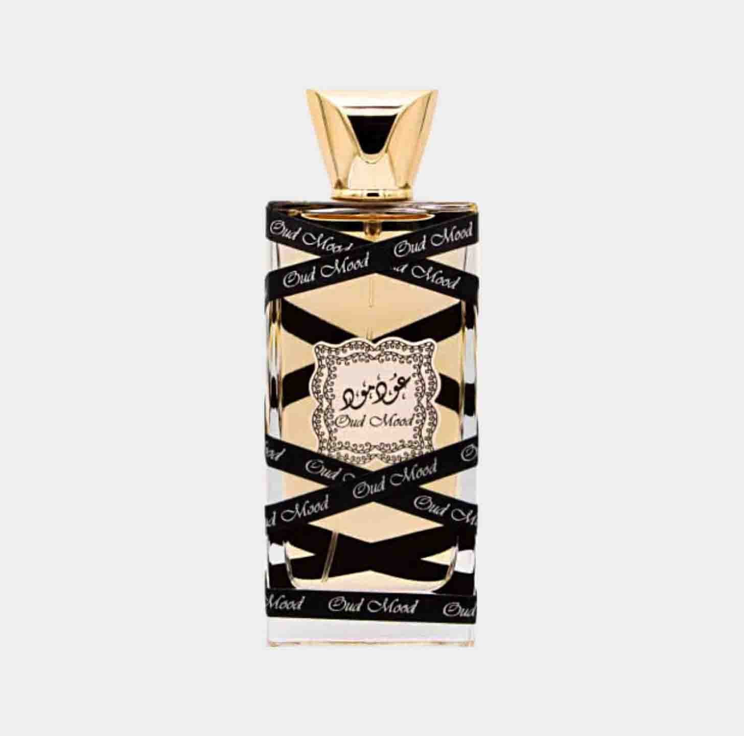 A stylish bottle of Lattafa Perfumes Oud Mood Sample featuring an elegant design with black and gold accents, showcasing its luxurious and sophisticated aesthetic.