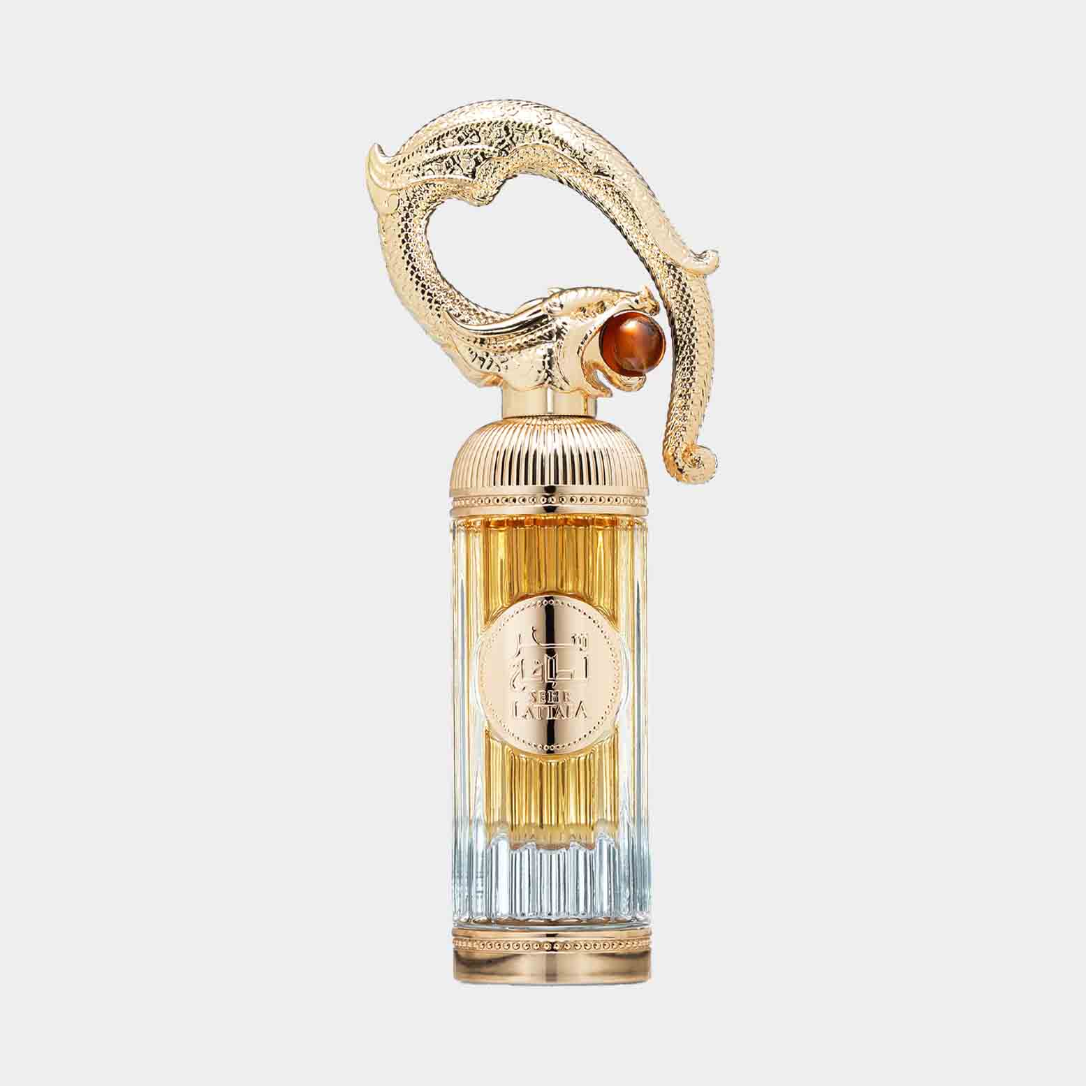 A decorative bottle of Lattafa Sehr Sample perfume, featuring an ornate golden cap shaped like a mythical creature, with a blend of clear and amber-colored liquid inside.