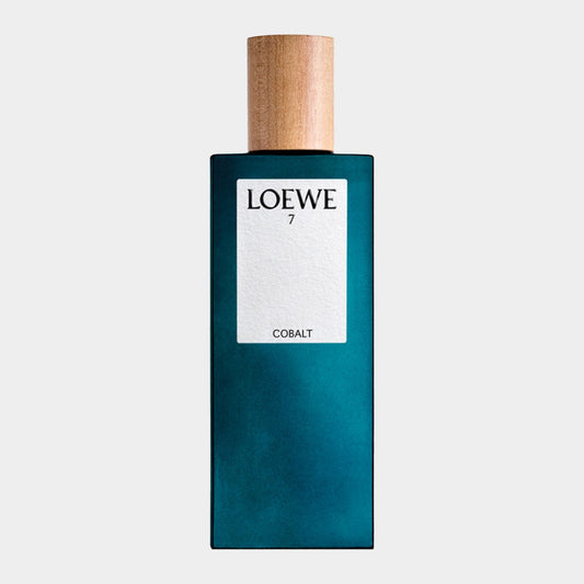 A sleek, rectangular bottle of Loewe 7 Cobalt Sample, featuring a wooden cap and a deep blue-green glass exterior with a minimalist label.