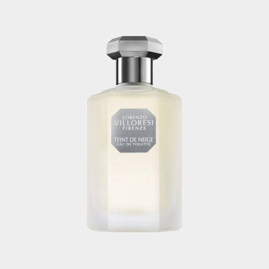 Lorenzo Villoresi Teint de Neige EDT sample featuring a sleek, frosted glass bottle with a geometric silver cap, exuding elegance and sophistication. The fragrance is known for its delicate and powdery notes, reminiscent of soft snow.