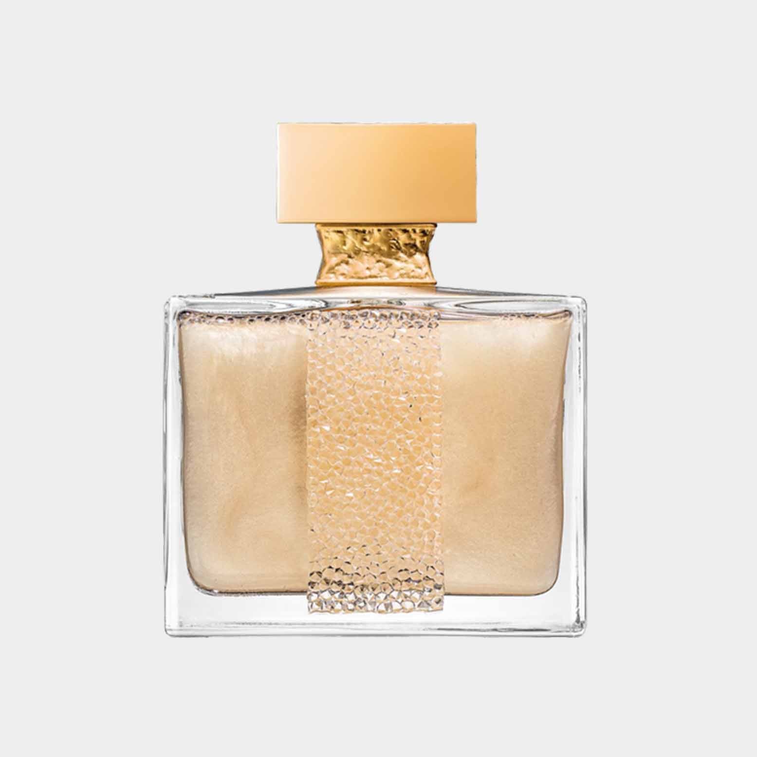 A bottle of M. Micallef Ylang in Gold Sample perfume, featuring a sleek rectangular design with a gold accent and a textured strip, showcasing its luxurious fragrance. The bottle contains a shimmering golden liquid, reflecting elegance and sophistication.