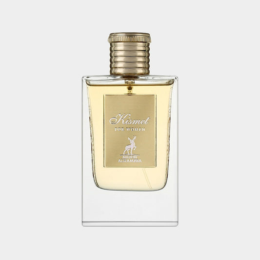 A clear glass bottle of 'Maison Alhambra Kismet For Women Sample' perfume, featuring a gold cap and an elegant label, showcasing a light amber fragrance.