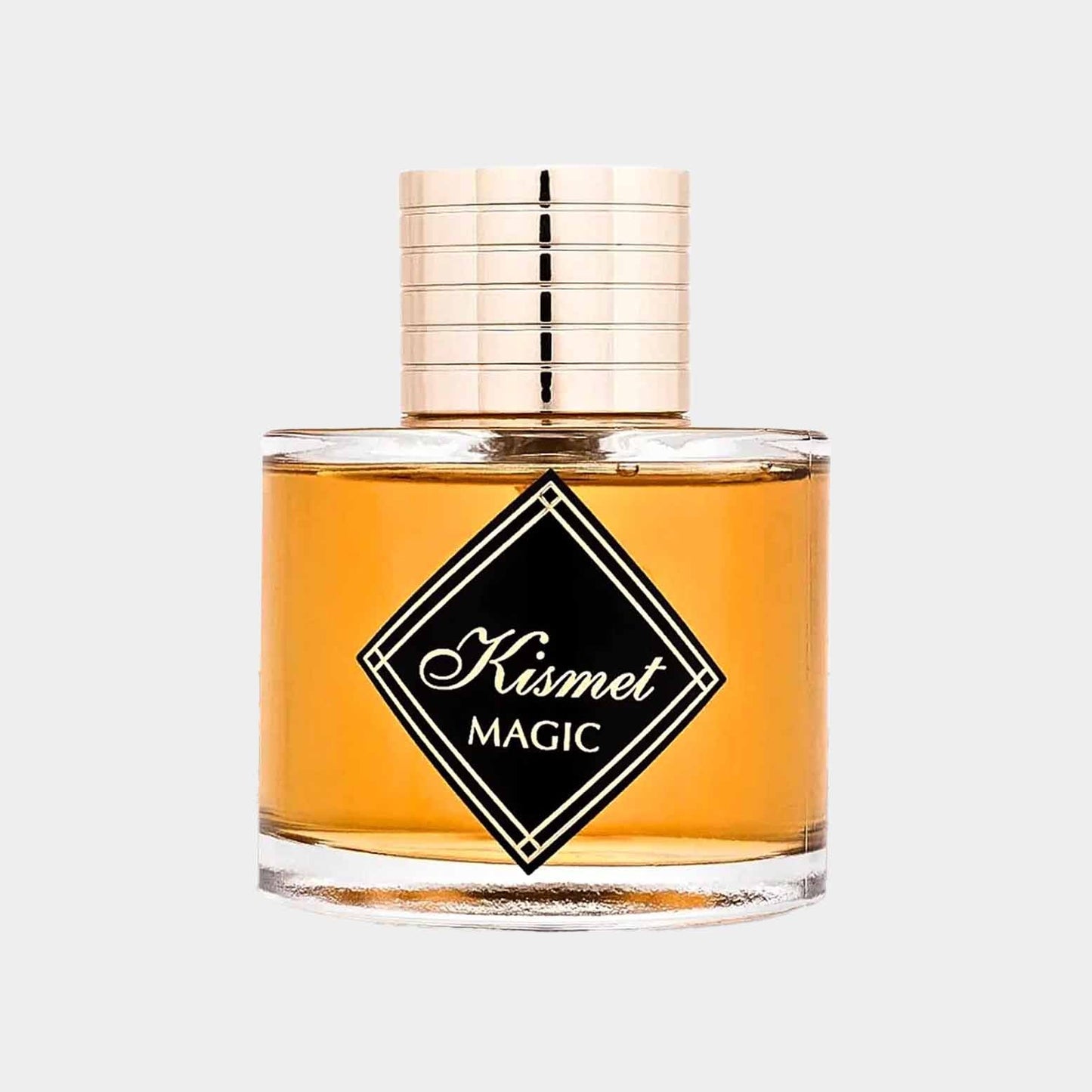 A small glass bottle of Maison Alhambra Kismet Magic perfume, featuring a gold cap and a prominent black label with the words Kismet MAGIC. The liquid inside is a warm amber color.