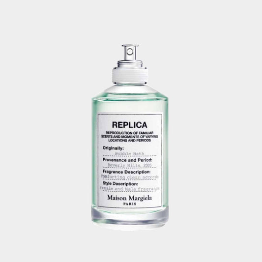 Maison Martin Margiela Replica Bubble Bath Sample, featured in a clear glass bottle with a minimalist label, capturing the essence of soothing and refreshing bath scents.