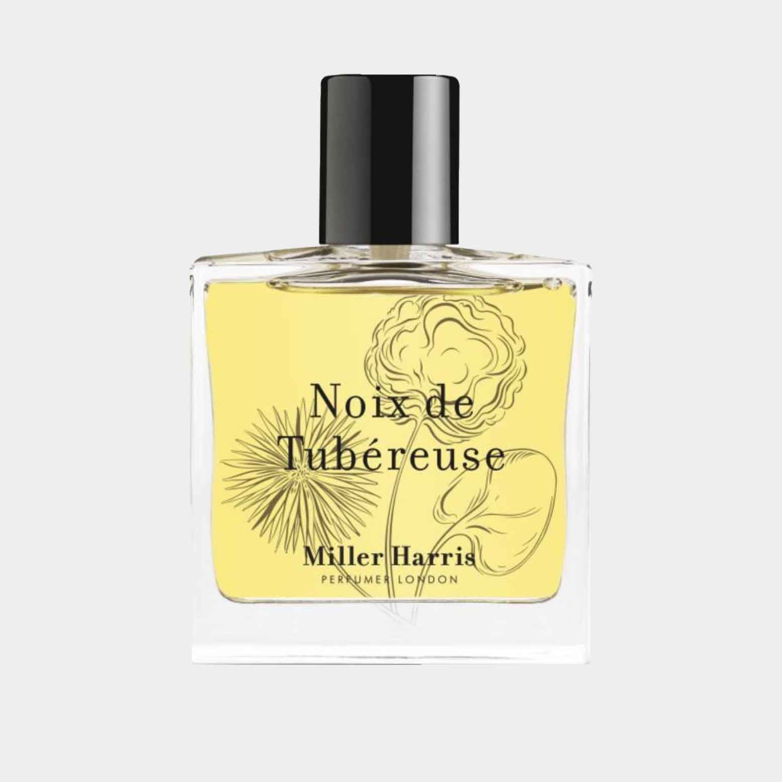 A glass sample bottle of Miller Harris Noix de Tubereuse perfume, featuring a yellow liquid and a black cap, adorned with botanical illustrations on the label.