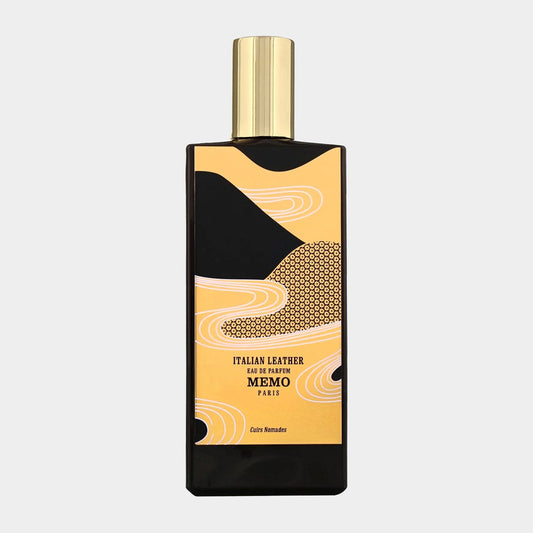 A stylish bottle of Memo Paris Italian Leather Eau de Parfum, featuring a bold design with orange and black patterns, elegantly capped with a gold top.