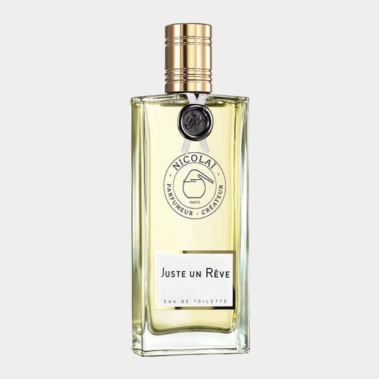 Nicolai Parfumeur Juste un Rêve Sample is a luxurious eau de toilette presented in an elegant bottle featuring a golden cap and a signature label.
