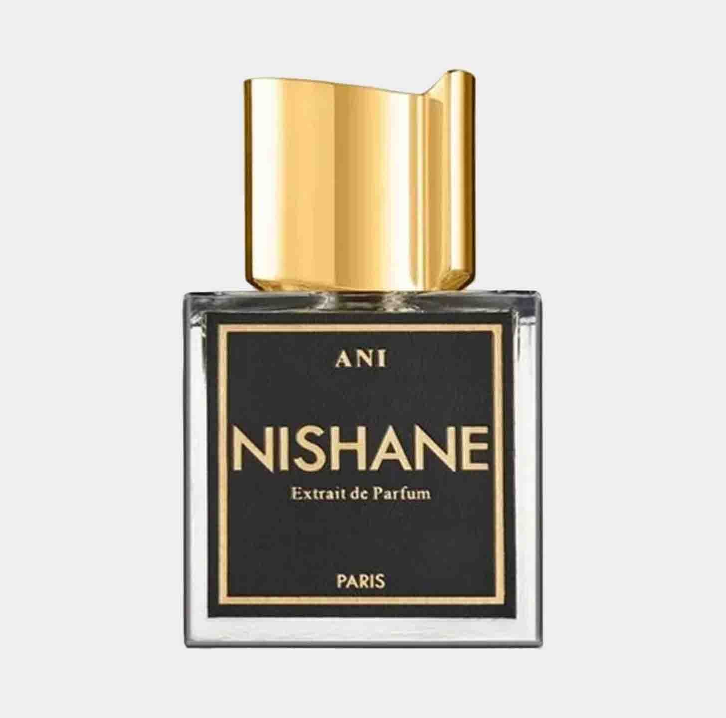 A luxurious small bottle of Nishane Ani EXDP Sample, featuring a sleek design with a black label and a golden cap, showcasing its elegance and sophistication.