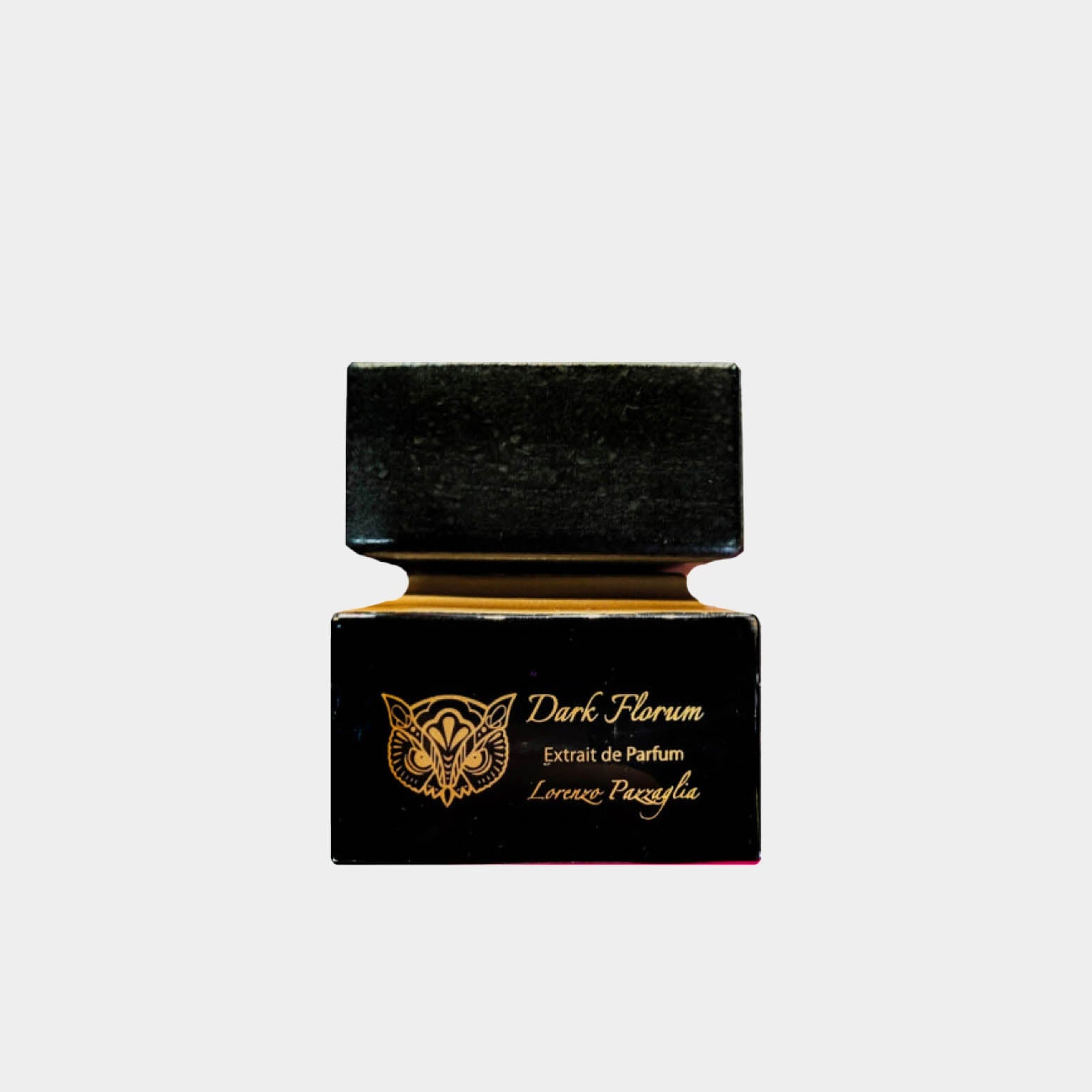 A small black bottle of Lorenzo Pazzaglia Dark Florum Extrait de Parfum, featuring elegant gold lettering on the front. The design is sleek and sophisticated, highlighting the luxurious essence of the fragrance inside.