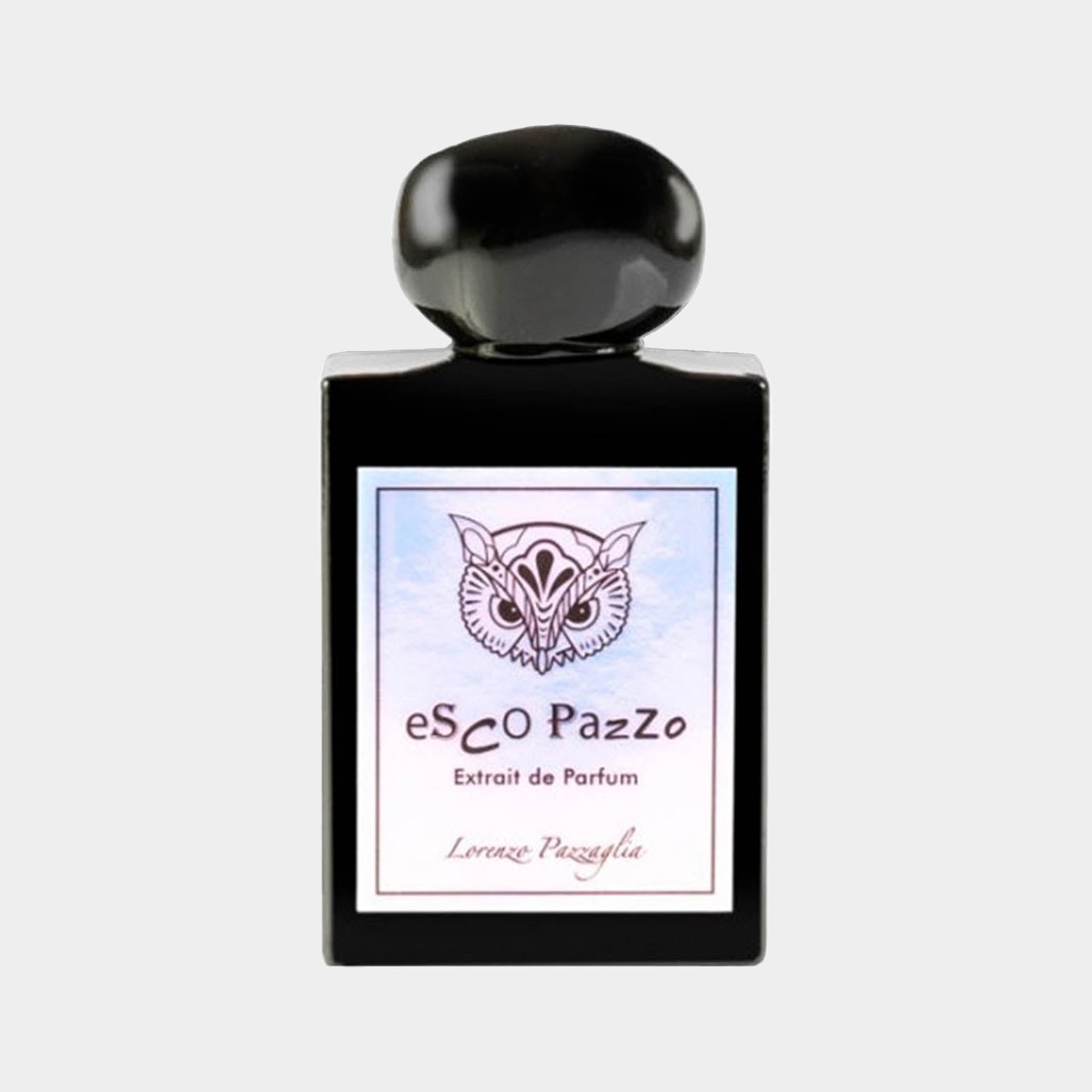 A sleek black perfume bottle with a round cap, featuring a label that reads Lorenzo Pazzaglia Esco Pazzo Extrait de Parfum, adorned with an artistic owl design.