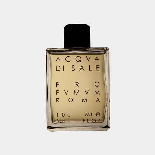 A clear glass bottle of Profumum Roma Acqua di Sale perfume, featuring minimalist packaging with black text and a black cap. The bottle holds 100 ml of fragrance.