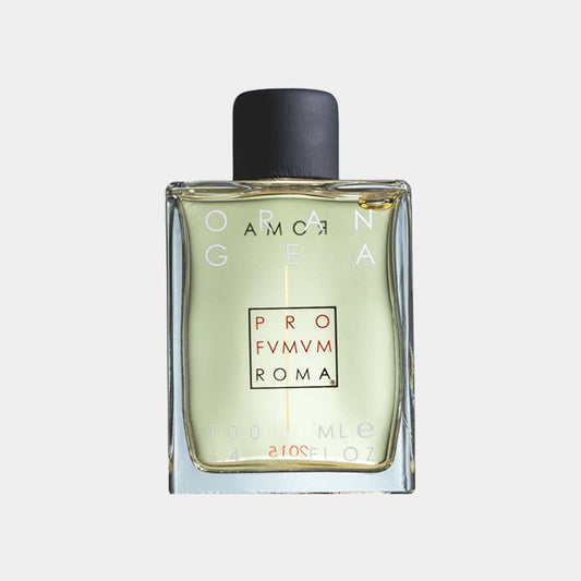 A clear glass bottle of Profumum Roma Orangea sample, featuring a minimalist design with a black cap and a label displaying the brand name. The fragrance inside is a light yellow hue.