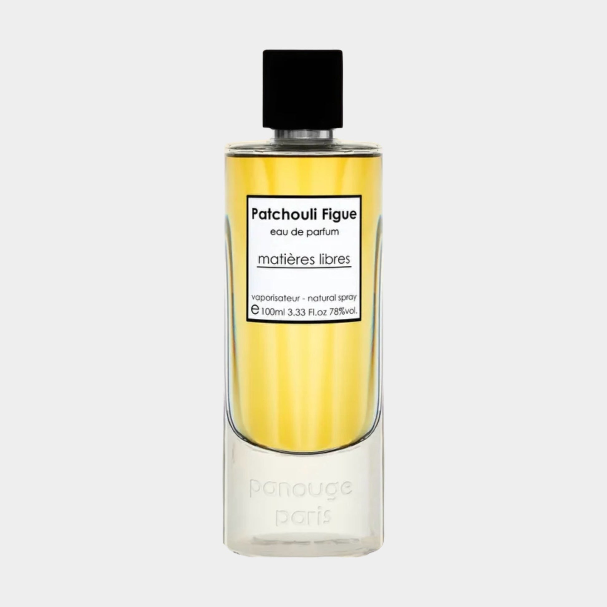 Panouge Paris Patchouli Figue Sample, featuring a sleek transparent bottle with a black cap, containing a warm, golden fragrance.