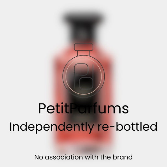 A blurred image of a chic bottle labeled 'Patchouli Paris Sample' from PetitParfums, highlighting its independently re-bottled nature with no association to the original brand.