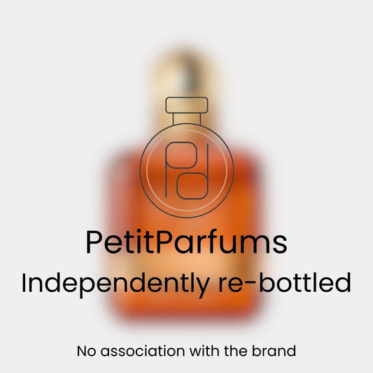 Sample bottle of Stronger With You Amber Exclusive Edition by PetitParfums, showcasing an elegant amber-colored liquid. The design features a classic perfume bottle silhouette, hinting at an indulgent fragrance experience.