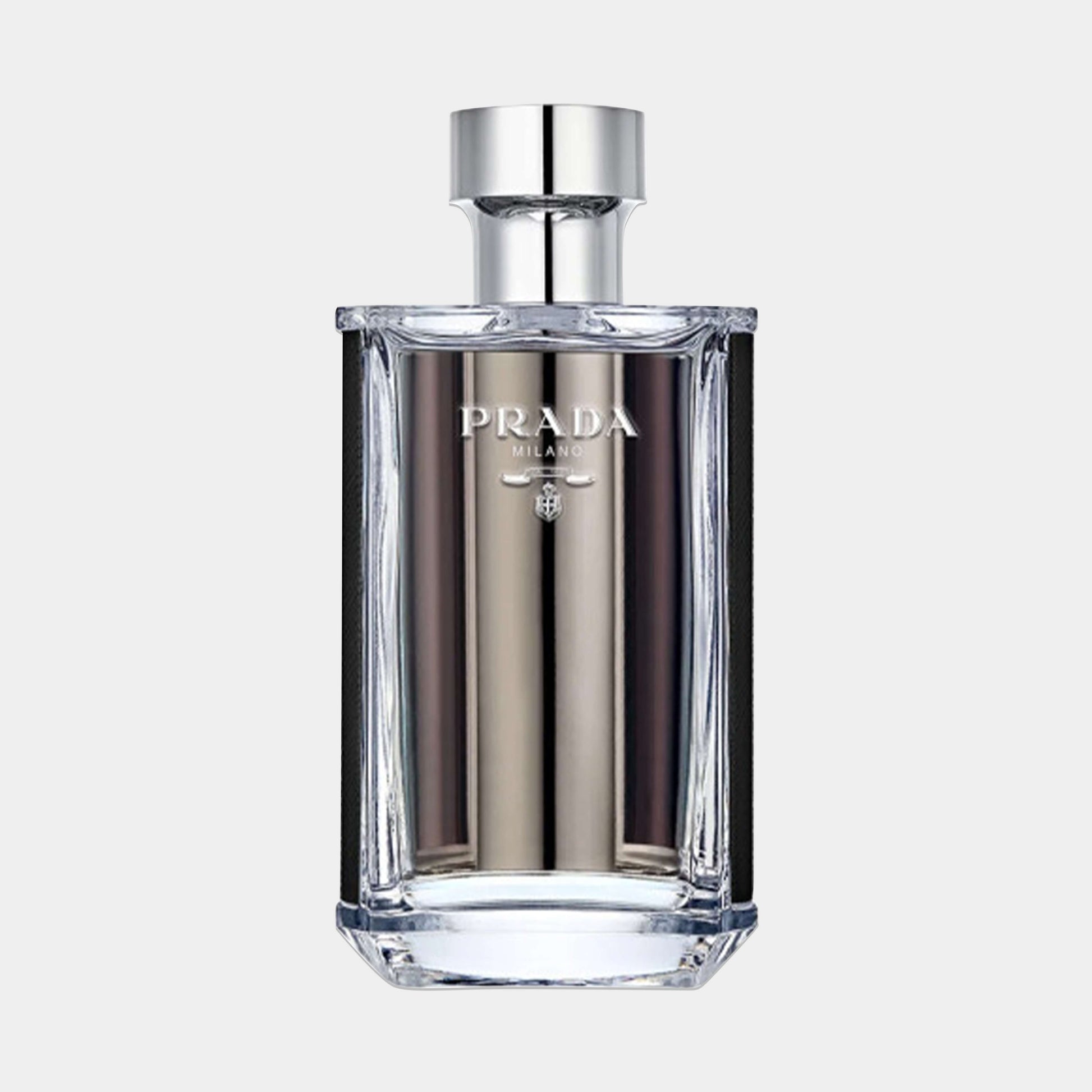 A sleek, modern bottle of Prada L'homme EDT Sample, featuring a clear glass design with silver accents and the brand's logo prominently displayed. The elegant shape and minimalistic style reflect the fragrance's sophisticated nature.