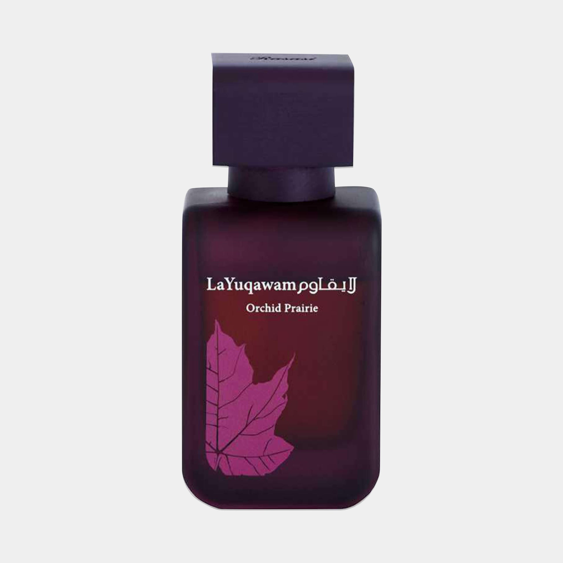 A sleek dark bottle of Rasasi La Yuqawam Orchid Prairie perfume, featuring an elegant purple leaf design and a sophisticated square cap. The fragrance embodies floral and earthy notes, perfect for a memorable scent experience.
