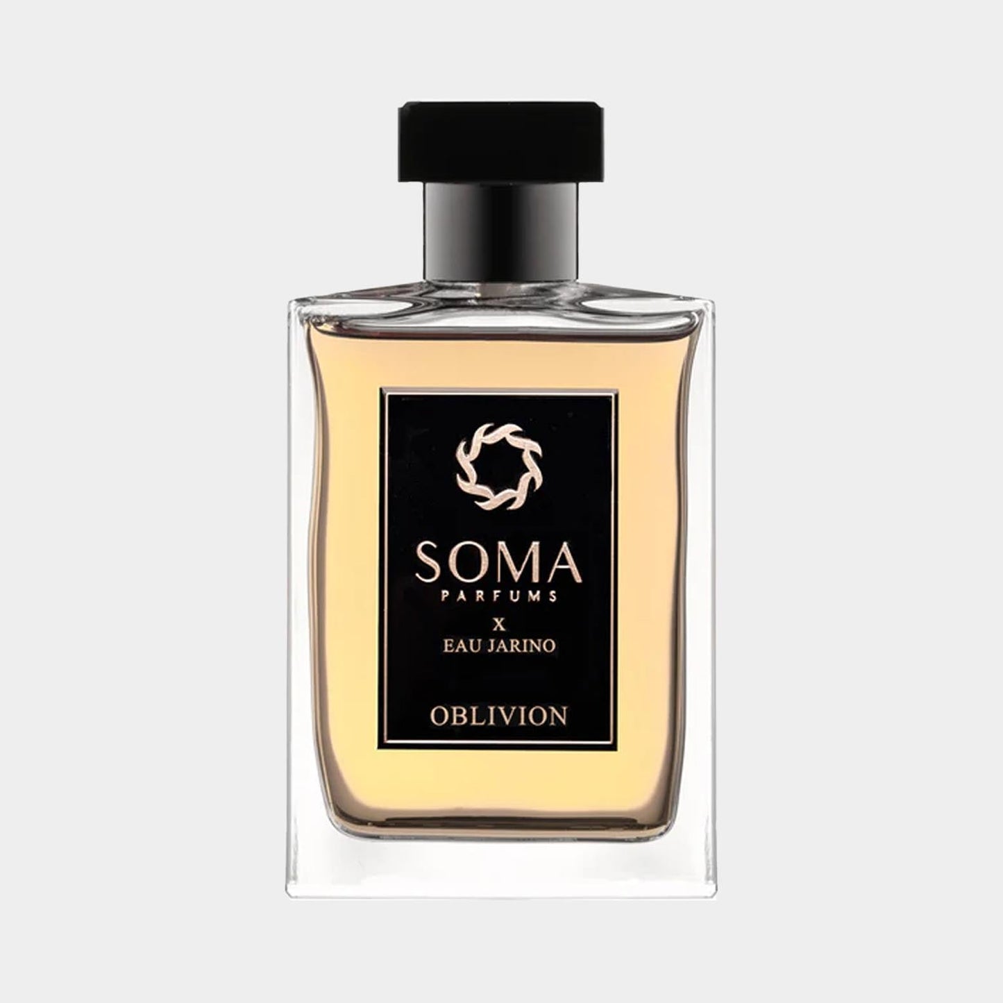 A clear glass bottle of Soma Parfums Oblivion Sample, featuring a black label with the brand name and a stylish design. The eau de parfum has a warm, amber hue, exuding an elegant and modern aesthetic.