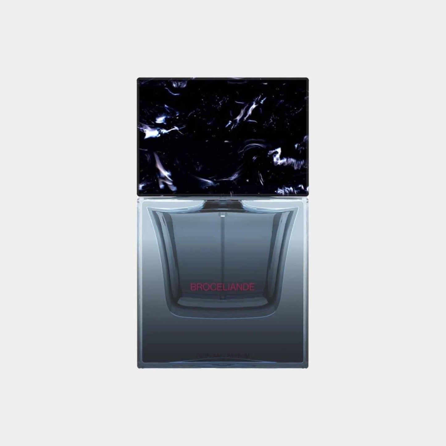 A sleek glass bottle of Sora Dora Broceliande fragrance, featuring a dark, marble-like cap and subtle branding on the front. The design is modern and elegant, emphasizing the luxurious essence of the perfume.