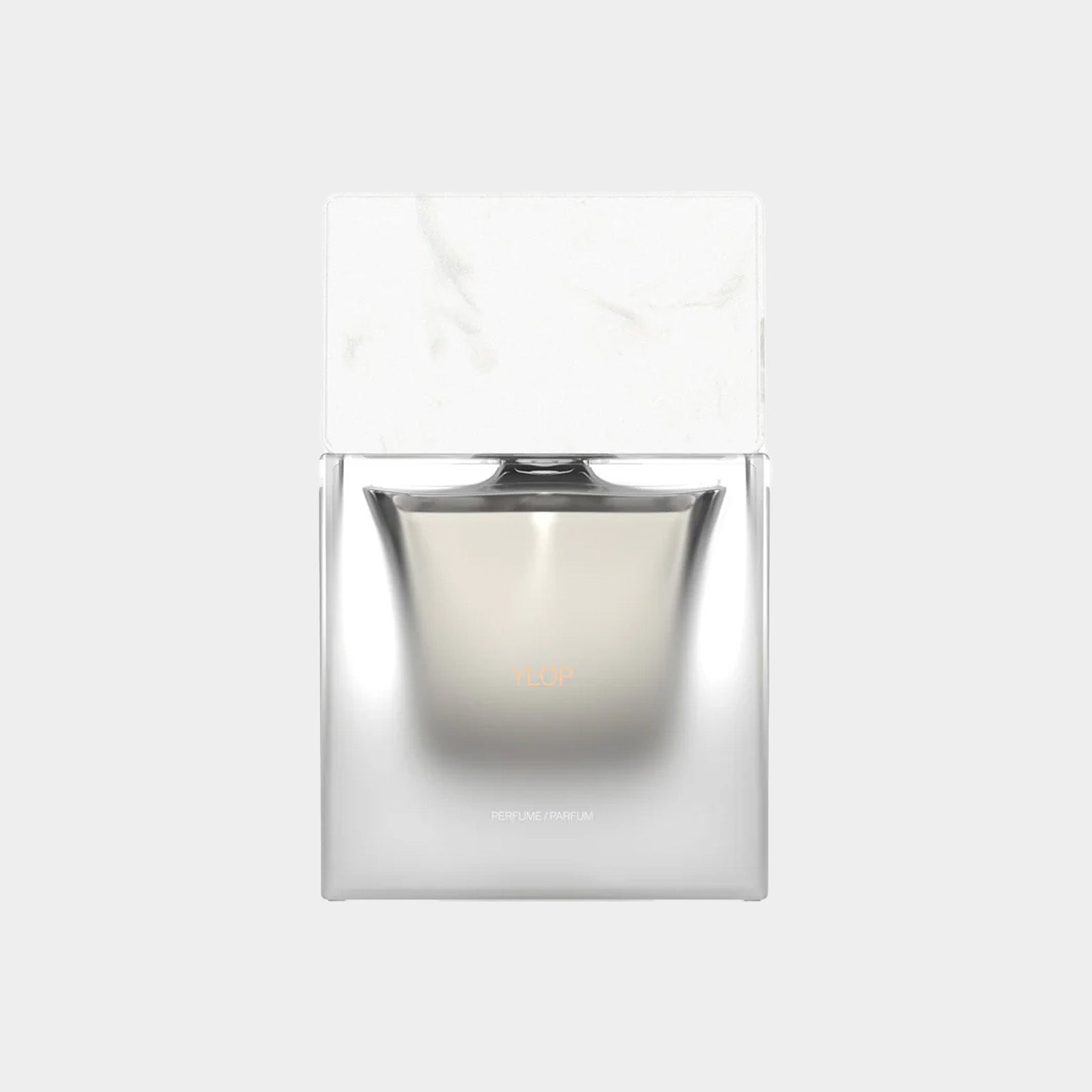 Sora Dora Ylop Sample fragrance in a sleek, modern bottle featuring a marble cap and a minimalist design.