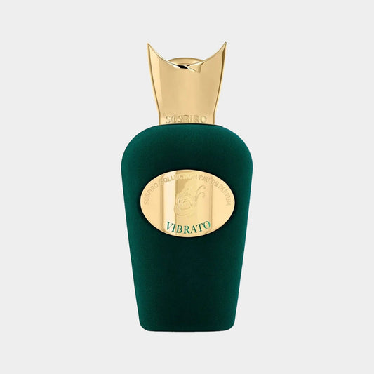 A green, velvet-textured bottle of Sospiro Vibrato Sample, featuring a gold emblem and an elegant, crown-like cap. The luxurious design reflects the fragrance's exquisite character.