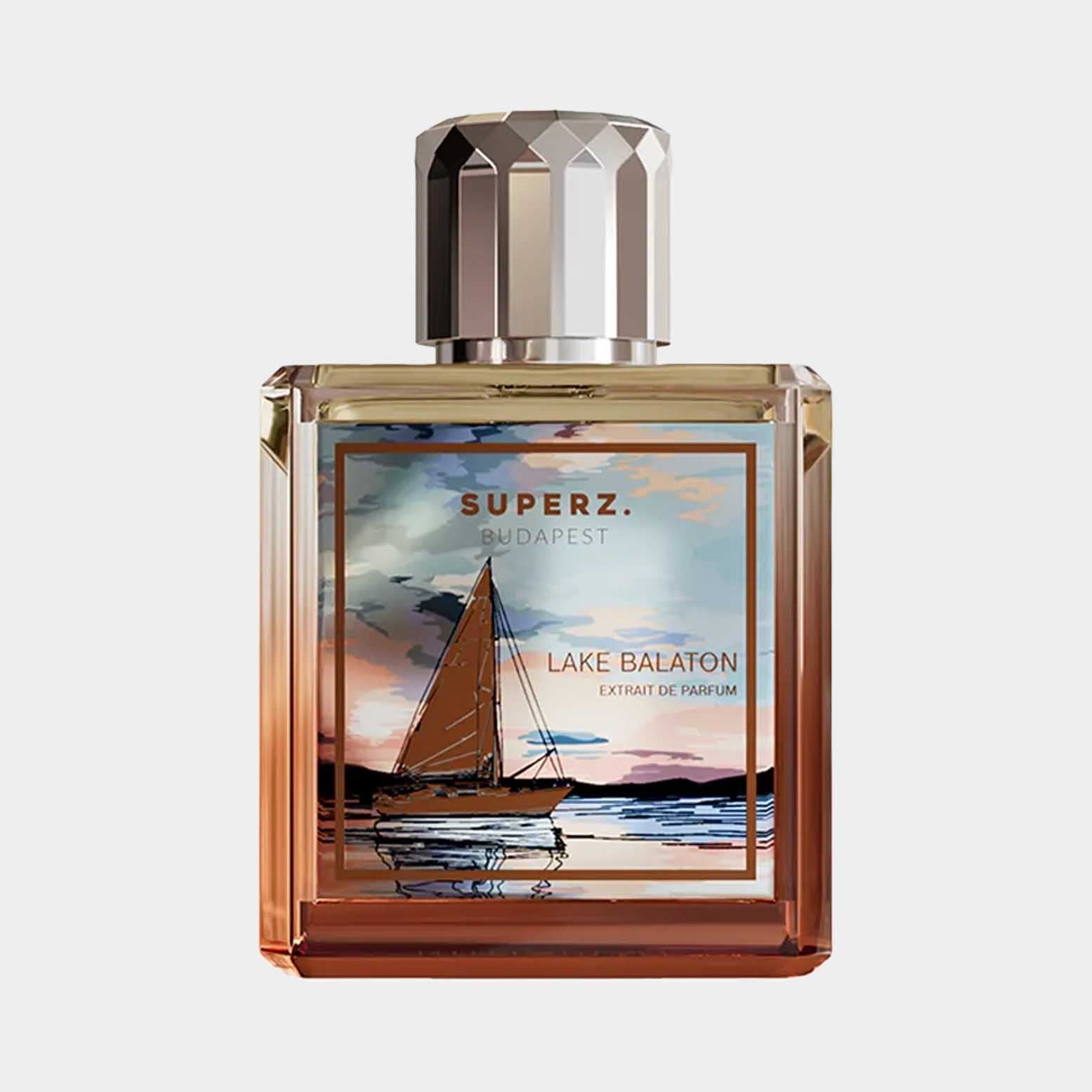 Superz Lake Balaton full bottle featuring a picturesque sunset with a sailboat on the lake, housed in an elegant glass container.