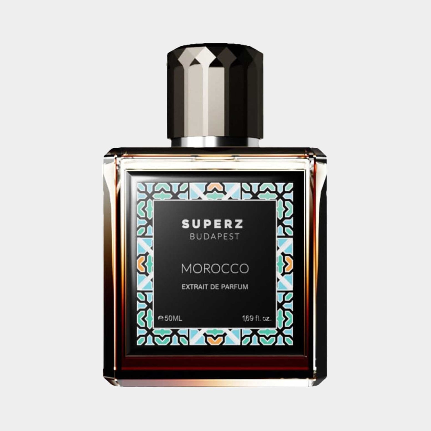 A square glass bottle of Superz Morocco perfume, featuring a decorative label with intricate patterns and a black cap, containing 50ml of extrait de parfum.