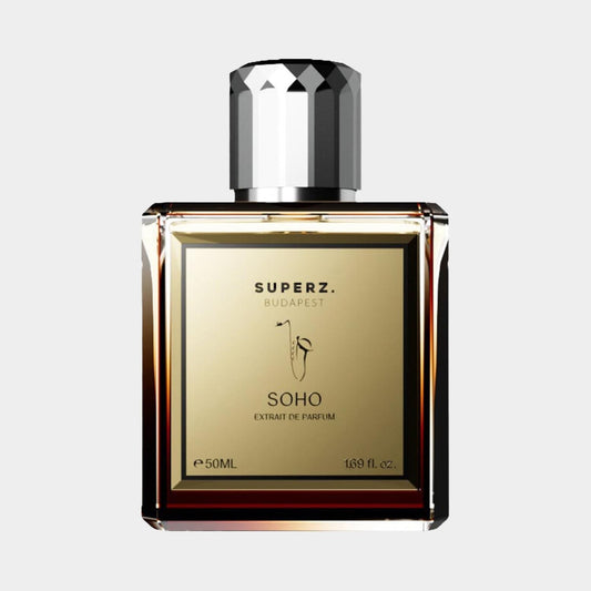 A bottle of Superz Soho Sample, an extrait de parfum, presented in a sleek rectangular design with a golden label and a faceted black cap, containing 50 ml of fragrance.