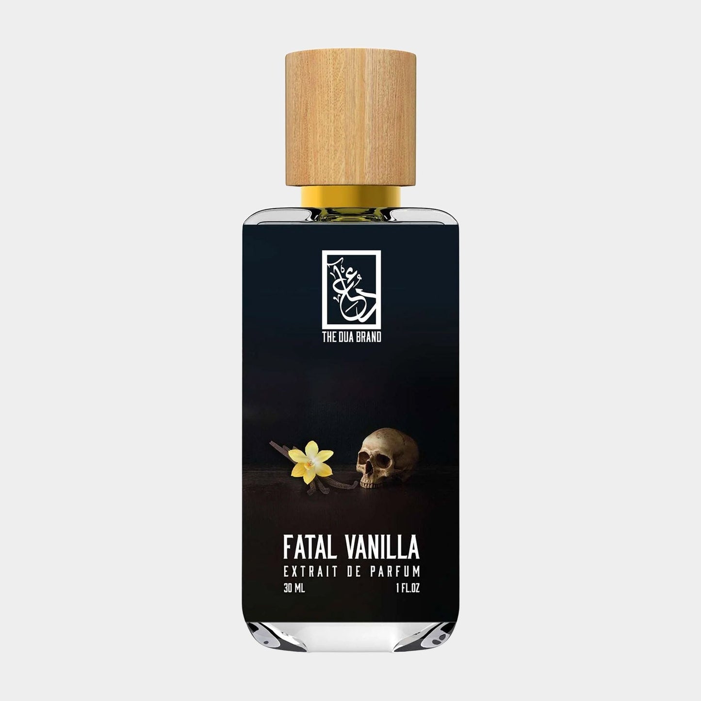 A sleek bottle of Dua Fatal Vanilla Sample, featuring a dark design with a skull and a vanilla flower, topped with a wooden cap. The label indicates it is a 30 ml extrait de parfum.