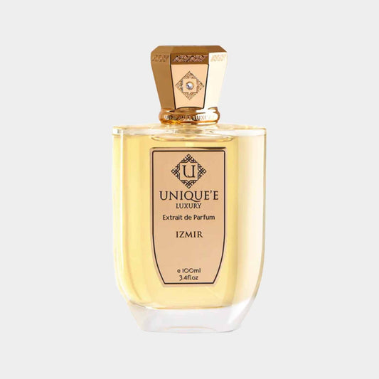 A stylish bottle of Unique'e Luxury Izmir Sample perfume, featuring an elegant design and a golden accent, contains 100ml of fragrant extrait de parfum.