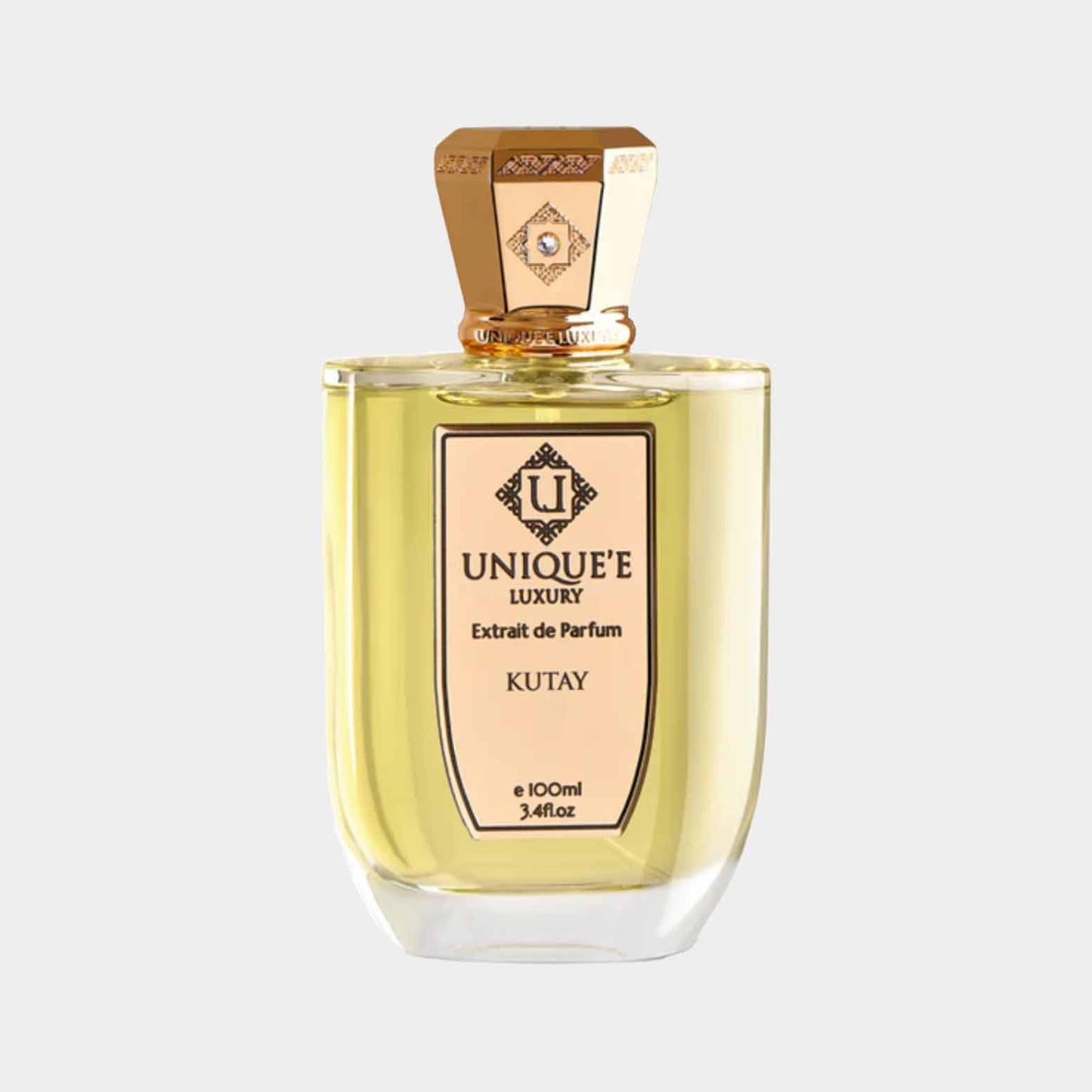 A 100ml bottle of Unique'e Luxury Kutay Extrait de Parfum, featuring an elegant design with a gold-accented cap and a clear glass body, showcasing the light amber fragrance inside.