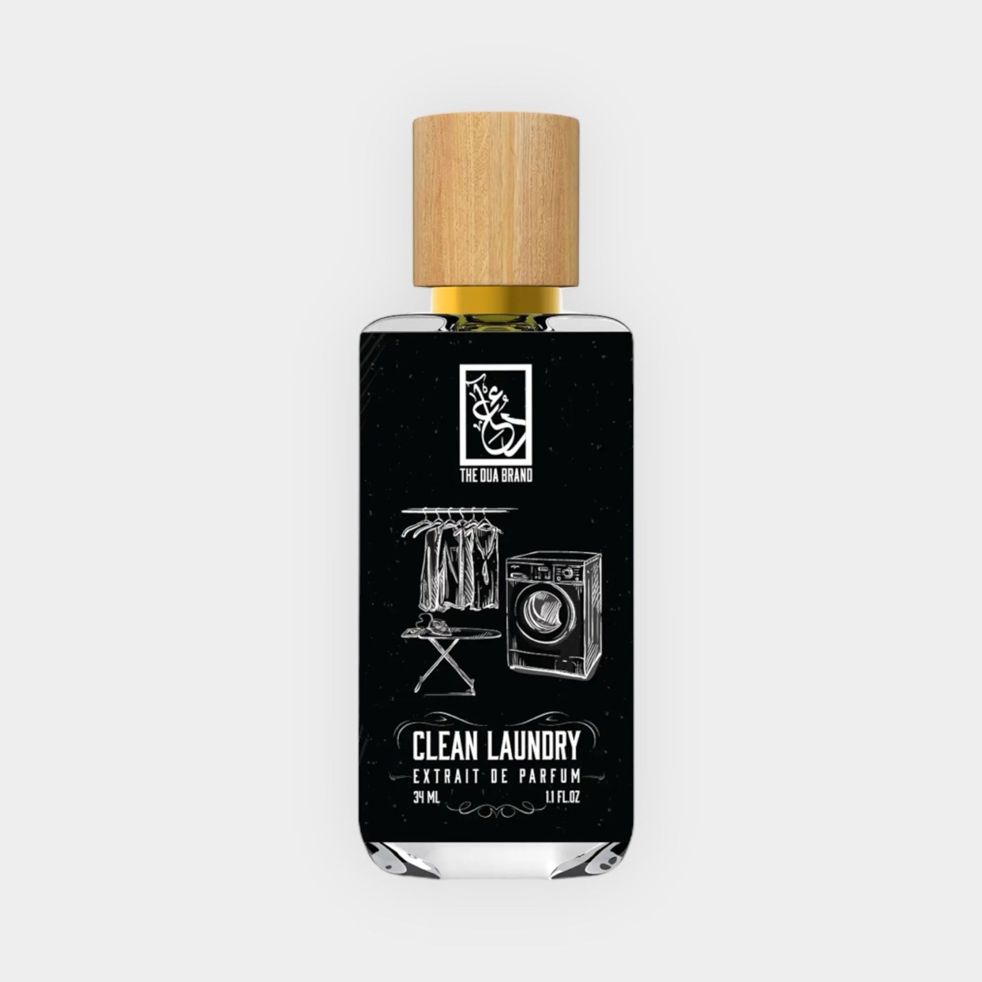 A sleek black bottle with a wooden cap labeled Dua Clean Laundry Sample, featuring illustrations of clothes and a washing machine, designed for laundry fragrance.
