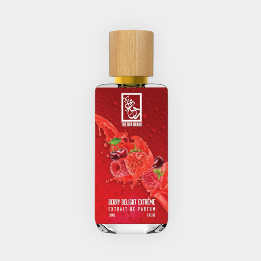 A bottle of Dua Berry Delight Extreme Sample, showcasing a vibrant red design with fruit illustrations and a wooden cap, containing 39ml of concentrated perfume extract.